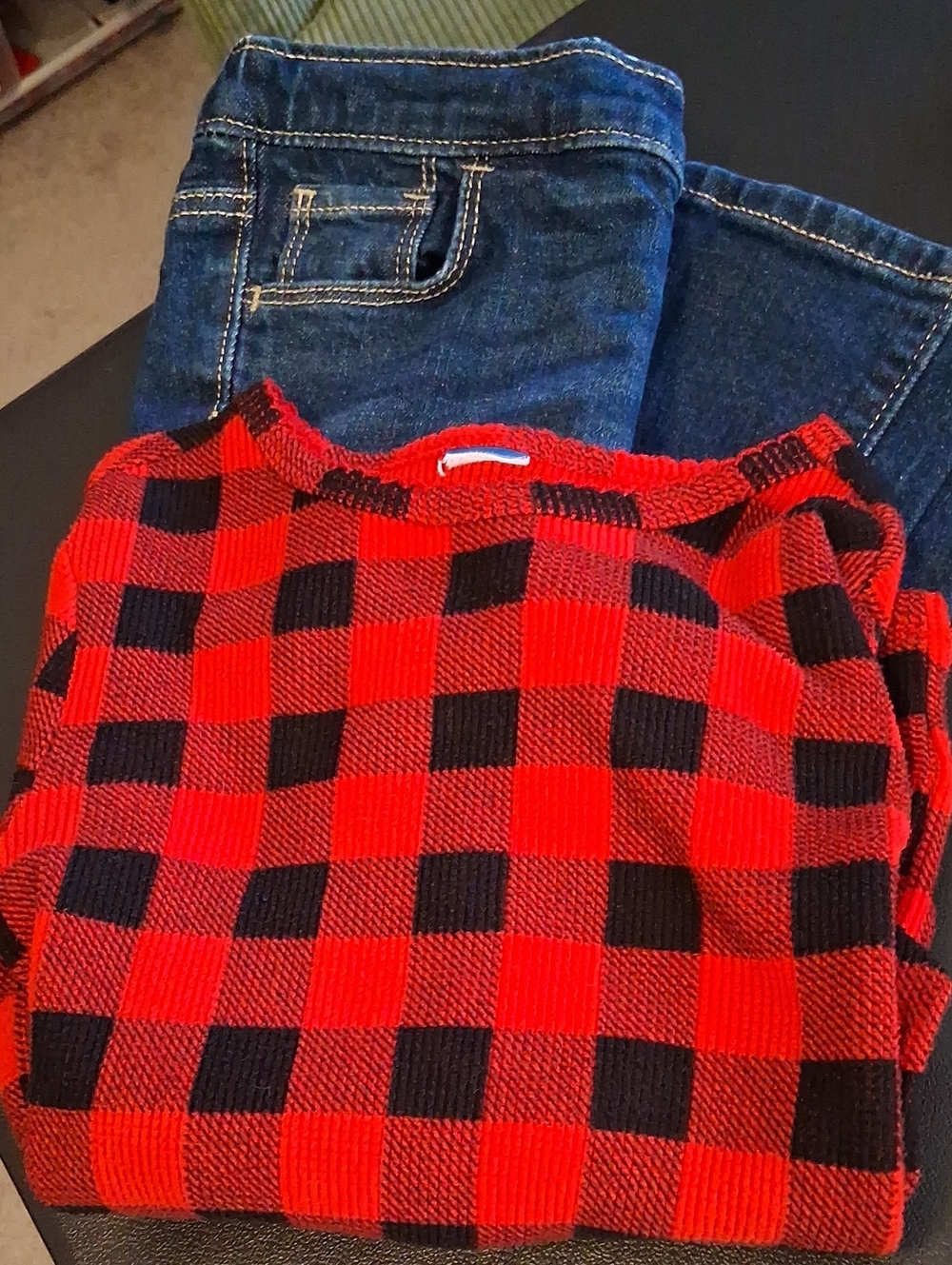 Old Navy Red and Black Buffalo-Check Crewneck Sweater With Blue Jean.